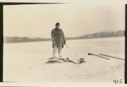 Image of Pascoo-Nascopie Indian [Innu] fishing for Rock Cod, Bowdoin Harbor